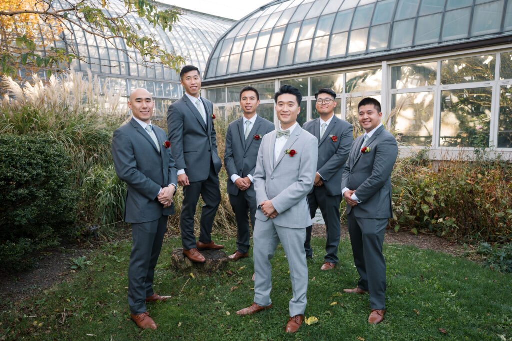 A stunning fall wedding at Garfield Park Conservatory in Chicago. The vibrant autumn foliage serves as a breathtaking backdrop for a couple’s ceremony in the Horticulture Hall, with floor-to-ceiling windows letting in the perfect natural light. Captured by Violet Carter Photography.