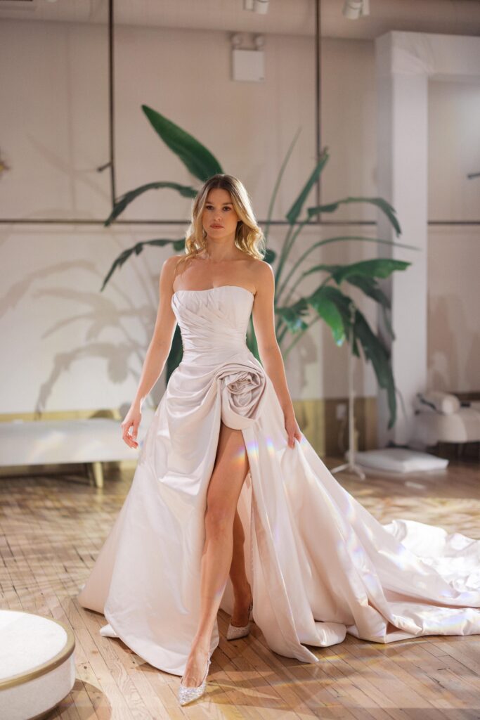 Galia Lahav couture ballgown with dramatic train and flower detail at New York Bridal Fashion Week 2025