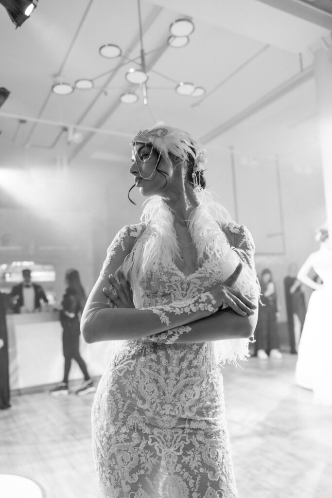  Galia Lahav couture ballgown with lace dress with feather head piece at New York Bridal Fashion Week 2025
