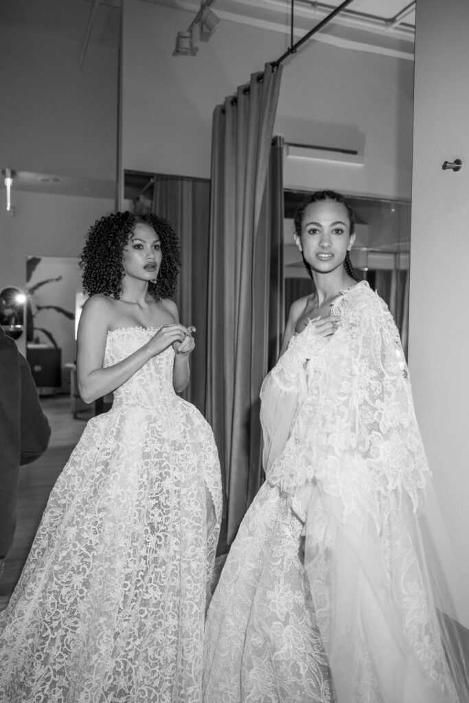Film photo of Galia Lahav lace wedding gown backstage at NY Bridal Fashion Week